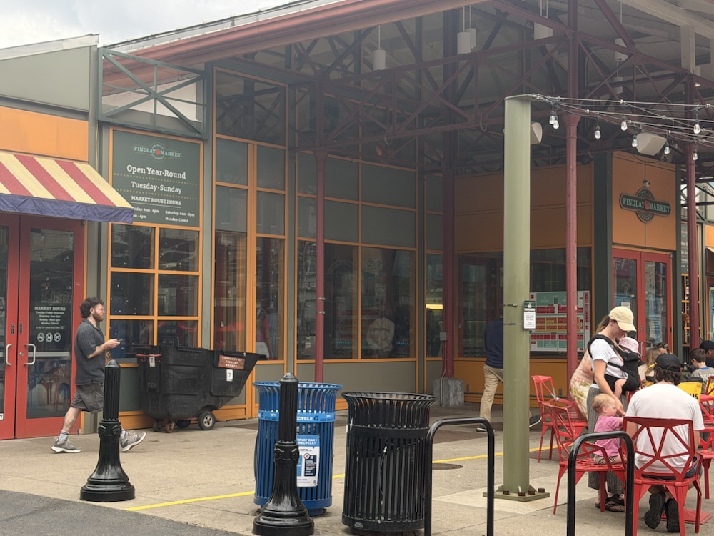 The edge of Findlay Market with people moving through the entrance area.