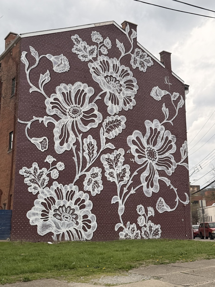 The Rookwood Revival floral mural by Christian Dallas at 1920 Race Street.